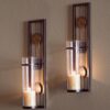 DANYA B Contemporary Metal Brown Wall Candle Sconces with Antique Patina Medallions (Set of 2)