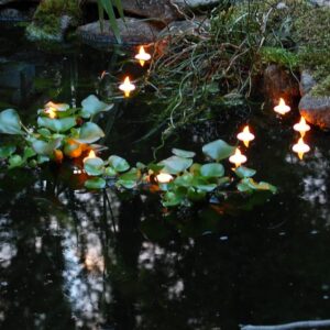 LUMABASE 1.25 in. x 1.25 in. x 1.25 in. Amber Floating LED Tea Light Candle (12-Count)